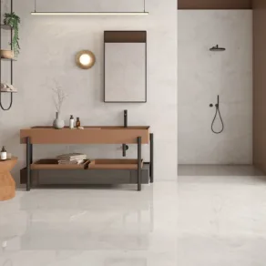 Badkamer vloer betegeld met gepolijste vloertegel Marmerlook Jumeirah Beige Creme NAV135