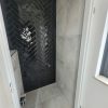 Cifre colonial black brillo op de toiletmuur gelegd