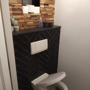 Visgraat tegels badkamer