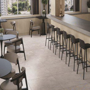 Vloertegel-80x80-cm-betonlook-ivoor-Kane-RBT129_sfeerfoto-restaurant-tegels